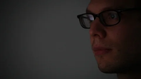 Man looking at computer screen, close up of face Stock Footage 98093806