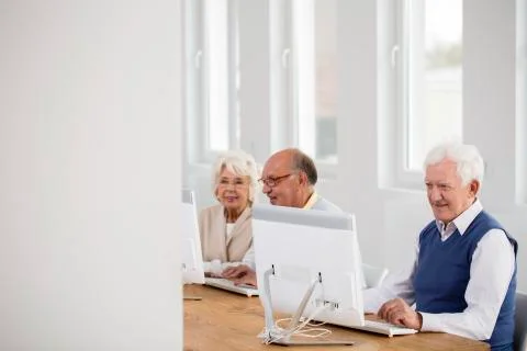 Man looking at computer screen Stock Photos
