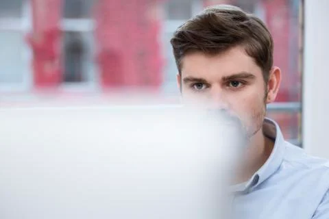 Man looking at computer screen Stock Photos