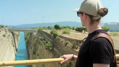 Man looking at Corinth Canal. Stock Footage 202231713