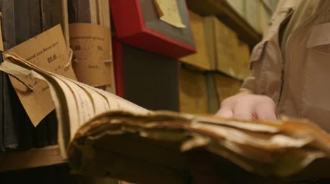 Man looking documents in the archive. Stock Footage 57704868