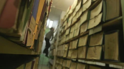 Man looking documents in the archive. Stock Footage 57705188