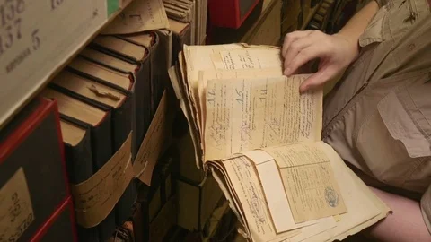 Man looking documents in the archive. 動画素材 70481761