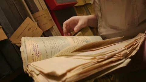Man looking documents in the archive. Stock Footage 70481817