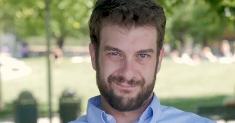 Man looking down and then showing he's unsatisfied by shaking his head no Stock Footage 81096336