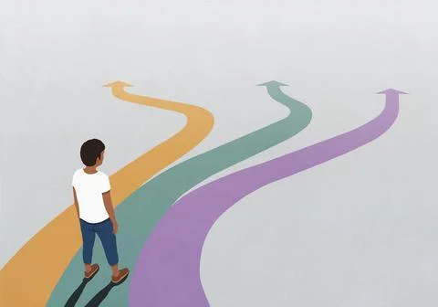 Man looking down at three multicolored arrow paths spreading before him Illustrazione stock