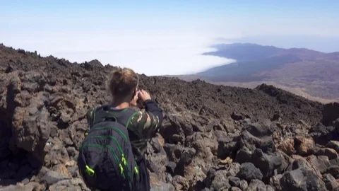 Man Is Looking Down On The Valley Stock Footage 72038792