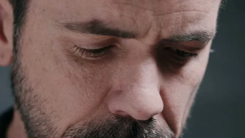 Man looking down while playing guitar Stock Footage 130792107