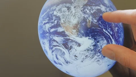 A man looking at the earth on a screen Video stock 102963493