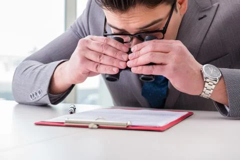 Man looking for errors and mistakes in report Stock Photos