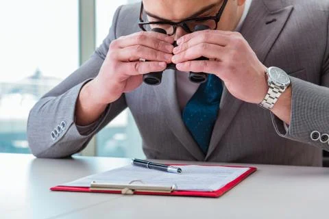 Man looking for errors and mistakes in report Stock Photos