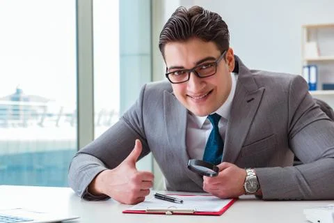 Man looking for errors and mistakes in report 스톡 사진