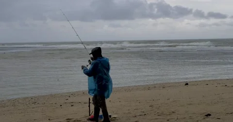 The man is looking for fish. Video stock 199372296