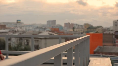 Man looking forward to the cityscape and thinking about future Stock Footage 95558447
