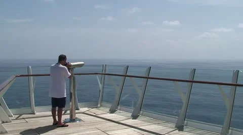 Man At Looking Glass on Cruise Ship Stock Footage 11237247