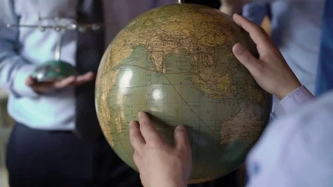 Man looking to globe Stock Footage