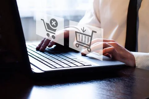A man is looking for goods on the Internet. The concept of finding things in Stock Photos
