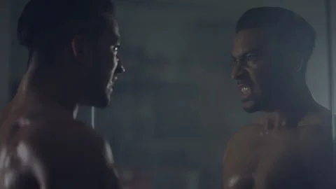 Man looking at himself in the mirror and screaming Stock Footage 279845804