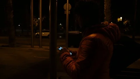 Man looking at his cell at night Stock Footage 104123463