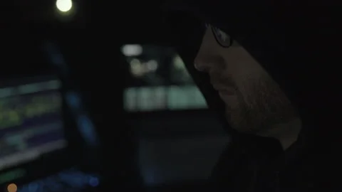 Man Looking at His Computer and Coding Stock Footage 208746690