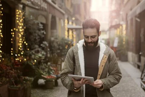 Man looking at his tablet Stock Photos