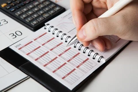 Man is looking for information, stadying plans Stock Photos