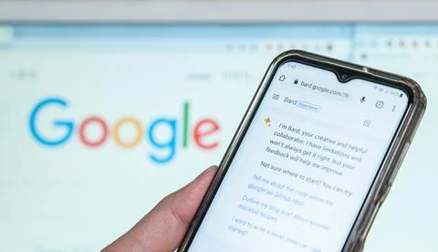 A man looking for information using artificial intelligence Google Bard Stock Photos