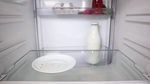 Man looking inside an empty fridge Stock Footage 135381365