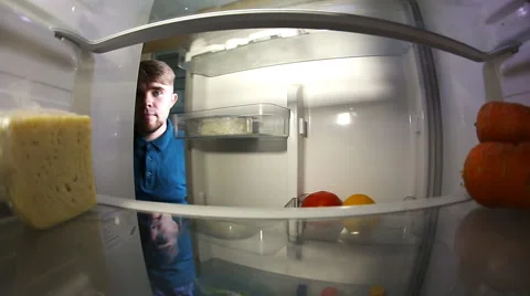 Man Looking Inside Fridge Stock Footage 51404861
