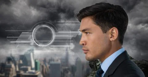 Man looking at interface over dark background Fotos de archivo