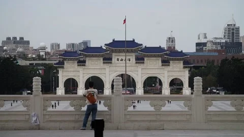Man looking Liberty Square Arch, Chiang Kai Shek Memorial, Taipei, Taiwan HD 40 Stock Footage 130594130