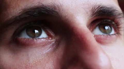Man looking Up To The Light - Eyes Close Up Stock Footage 248759691
