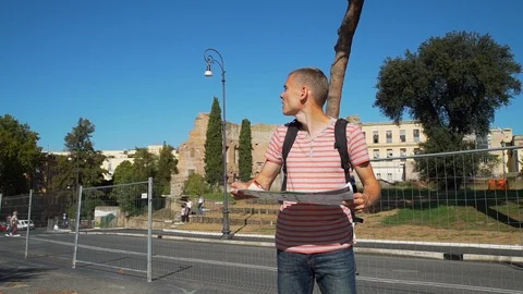 Man Looking at Map with Landmarks in Rome, Italy Stock Footage 121191568