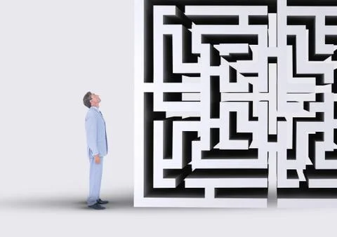 Man looking up to a maze 3d Foto stock