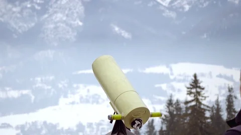 Man looking mountain through monocular binocular on tv tower Stock Footage 73754237