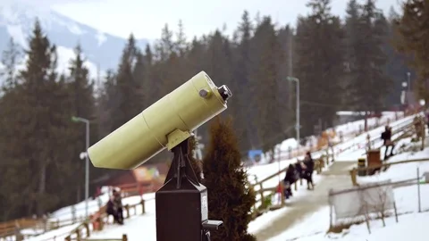 Man looking mountain through monocular binocular on tv tower Stock Footage 73754261
