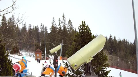 Man looking mountain through monocular binocular on tv tower Stock Footage 73754288
