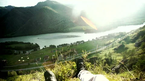 Man looking at the mountains. First-person view Stock Footage 66182901