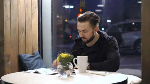 Man is looking on the newspaper Stock Footage 86383892