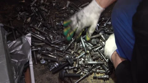 Man looking for a nut or bolt Stock Footage 139746614