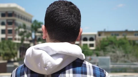 Man Looking Out  Over Balcony In Slow Motion Video stock 101490357
