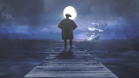 Man Looking Out to Sea at Ghost Ship with Full Moon 4K Stock Footage 125585367