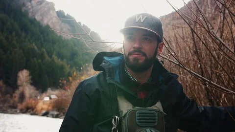 Man Looking Out With Sun Behind Him Stock Footage 83598521
