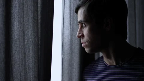Man looking out of the window Video stock 151628659