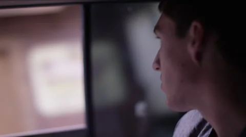 Man looking out of window while traveling in car, Guatemala Stock Footage 63054979