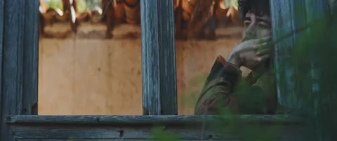 Man looking outside the window Stock Footage 202267313
