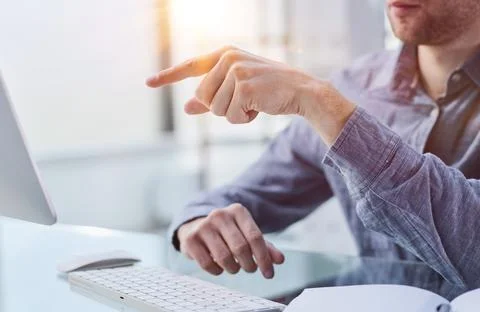Man Looking At Pc Computer For Mock Up Template Sitting At Desk At Office Stock Photos