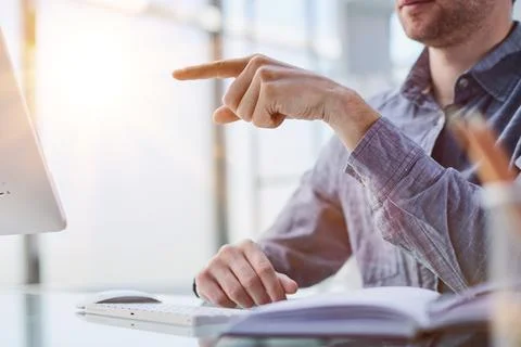 Man Looking At Pc Computer For Mock Up Template Sitting At Desk At Office Stock Photos