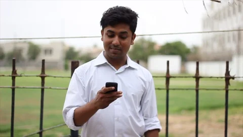 Man looking at phone Stock Footage 111774419