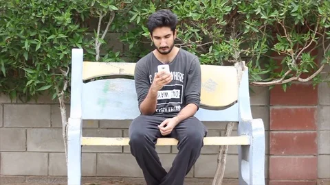 Man looking at phone Video stock 111774447